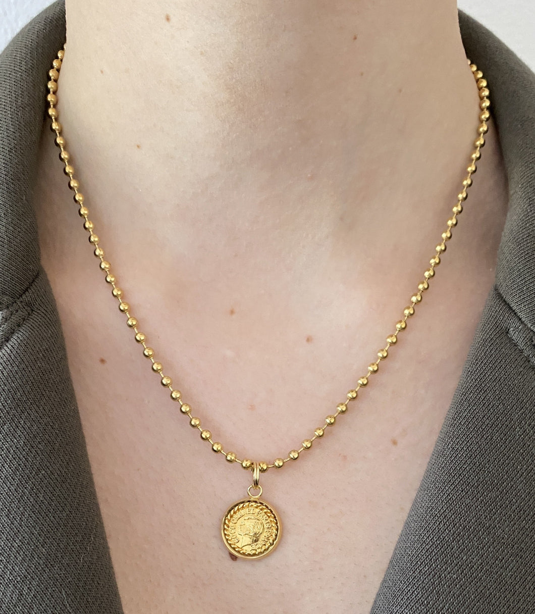 Collier upcyclé tête Chanel